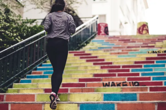 Person jogging on stairs