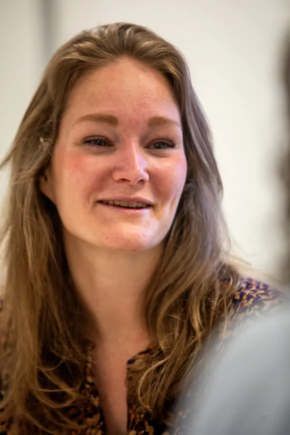 A portrait photo of Eveline Huis in 't Veld