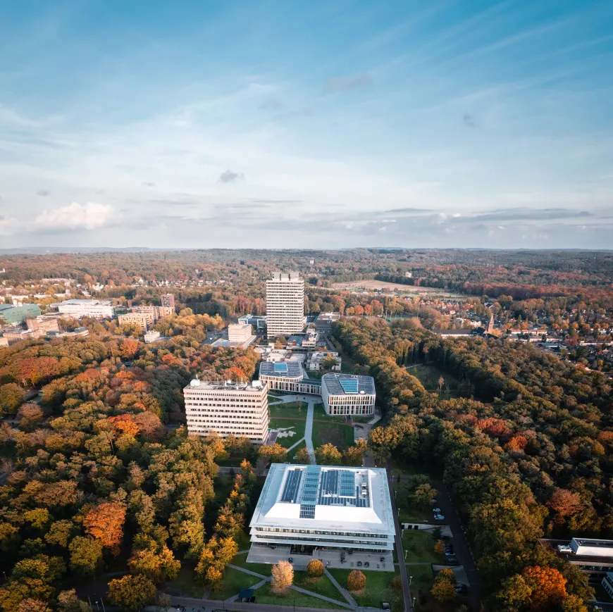 A photo of the Radboud University campus in autumn