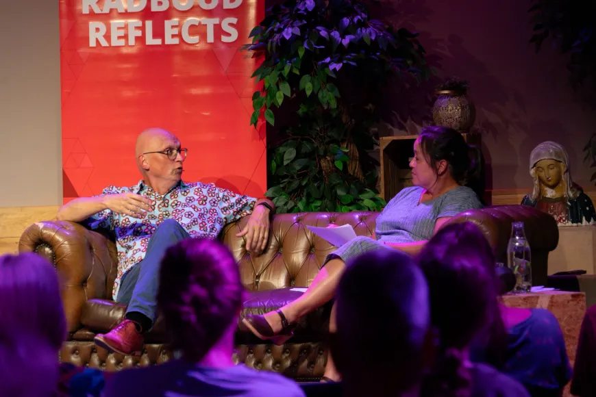 Martin Drenthen and Maite Tjon A Hie during in conversation on a sofa during Reflects lecture