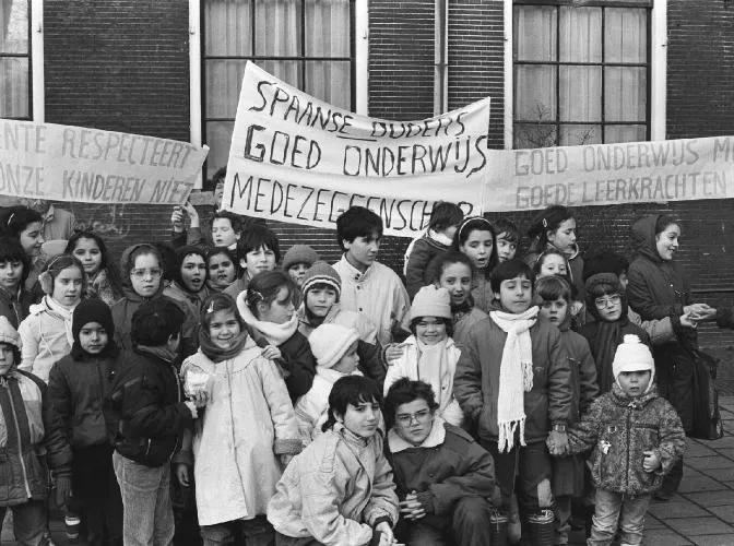 Black and white picture of multicultural classroom in the Netherlands protest