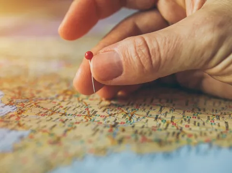 Red pin on worldmap