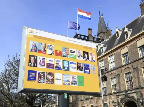 Political pamphlets on a sign