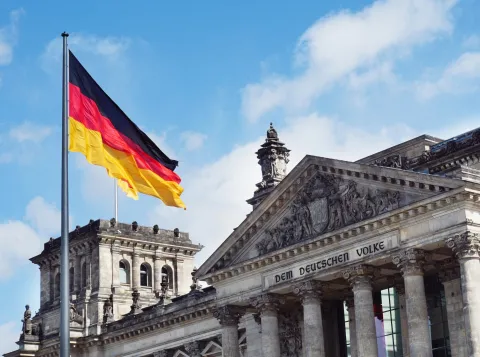 Old German building behind the German flag