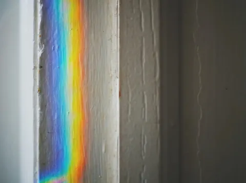 Rainbow reflection on a wall