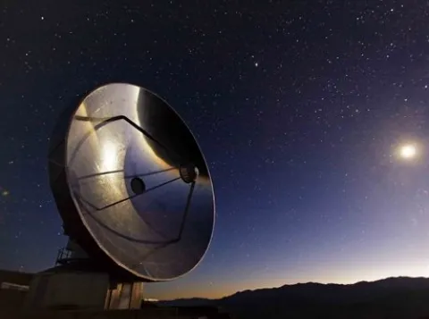 Telescope under the night sky