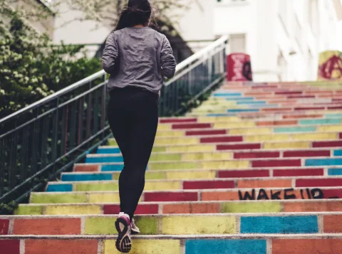Person jogging on stairs