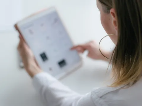 photo of a teacher using a teacher dashboard