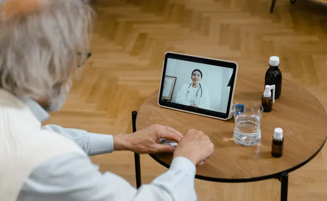 Patient talking to doctor on screen