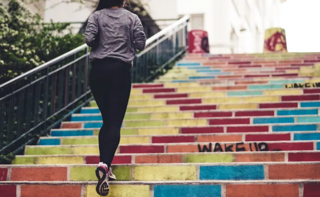 Person jogging on stairs
