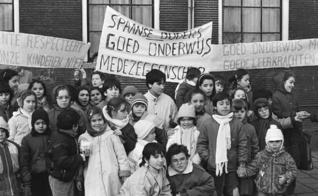 Black and white picture of multicultural classroom in the Netherlands protest