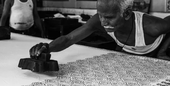 Man stamping on white surface