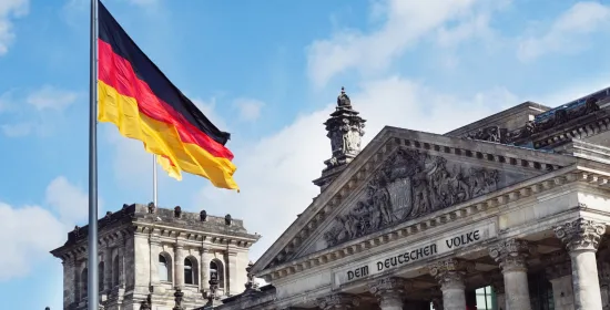 Old German building behind the German flag