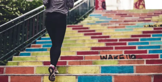Person jogging on stairs
