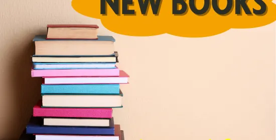Een stapel gekleurde boeken met "new books" ernaast