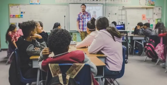 Hoe leren getraumatiseerde vluchtelingen een nieuwe taal?