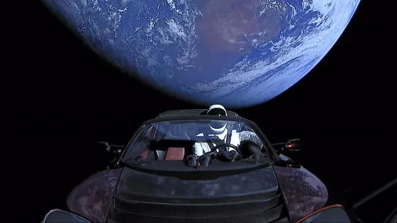 Astronaut in Tesla car in space