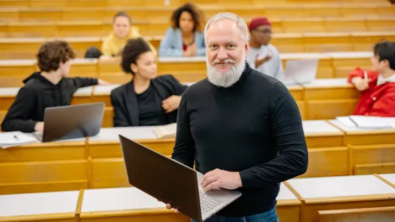 Teacher with students in a lecture hall